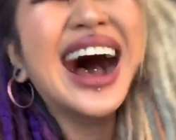 She also has various piercings including piercing on her lips, tongue, and nose.